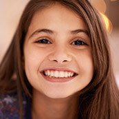Young girl with happy healthy smile