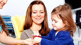 Mother and daughter at dental office