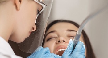 A young female having dental work done