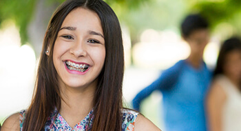 Happy girl with braces smiling