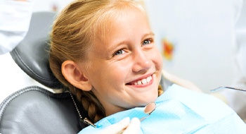 young girl in dental chair