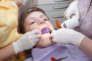 little boy in dentist chair